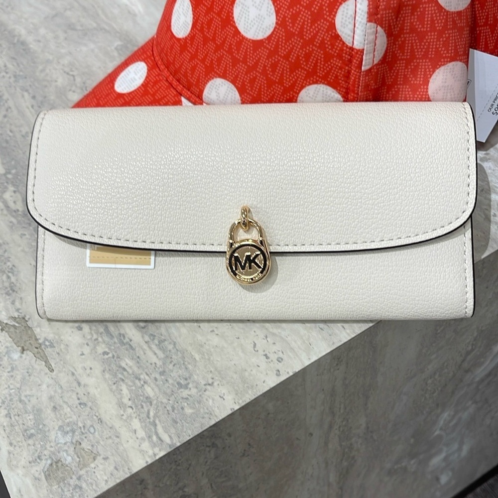 Michael Kors Hamilton Large Leather Continental Wallet
Light Cream
NWT - Picture 5 of 16